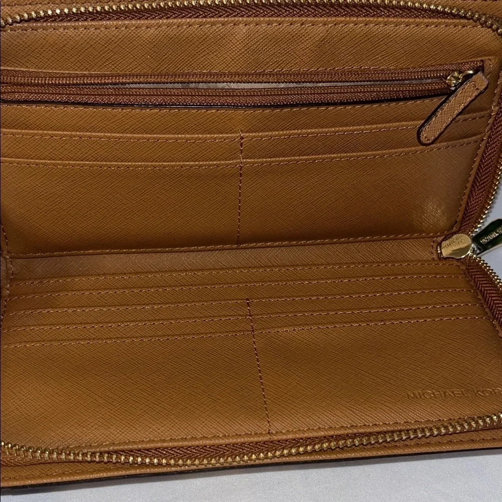 Michael Kors Dark Brown Wallet with Gold Hardware used good condition